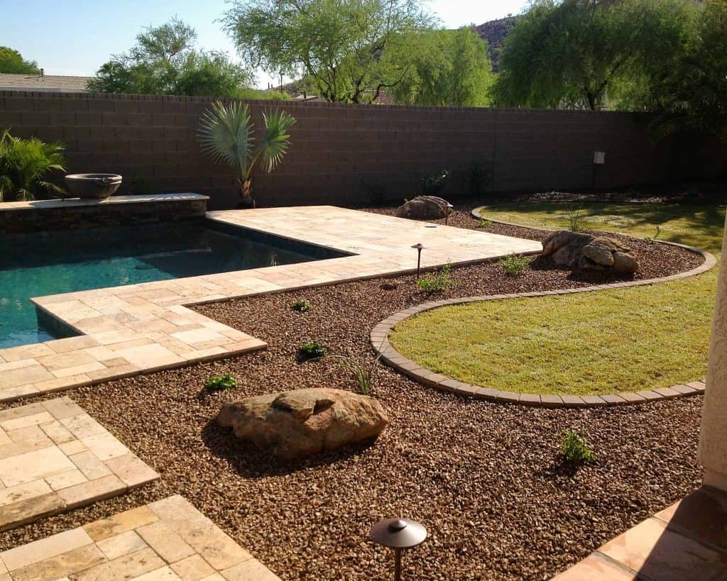 Well maintained and landscaped back yard. Done by Hawkeye Custom Landscaping